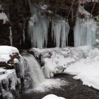 Hiking the frozen waterfalls of Ricketts Glen, Rickets Glen State Park, Pennsylvania.